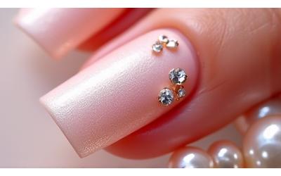 Luxury nail art with pearl and gem accents